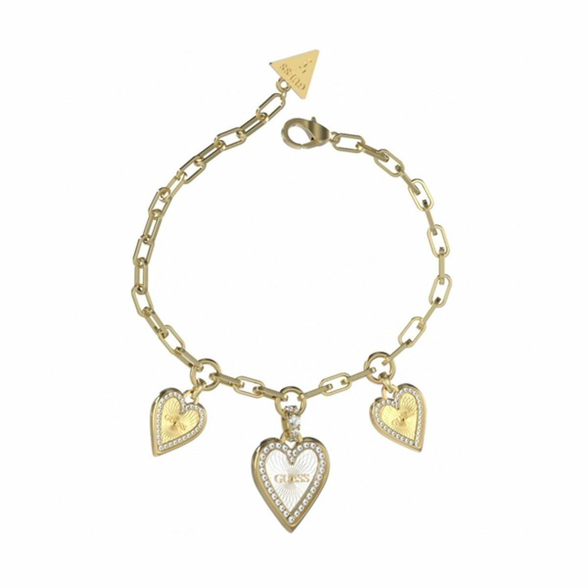 Gouden Guess armband met hartjesbedels, elegant en modieus ontwerp.