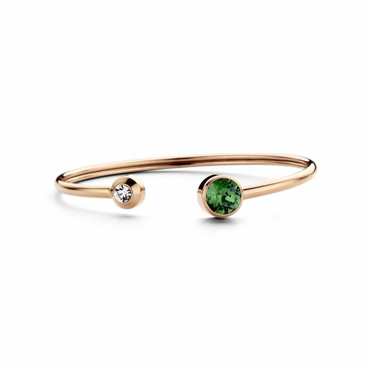 Detail van de CO88 Collection armband in roze goud met groene en heldere stenen.