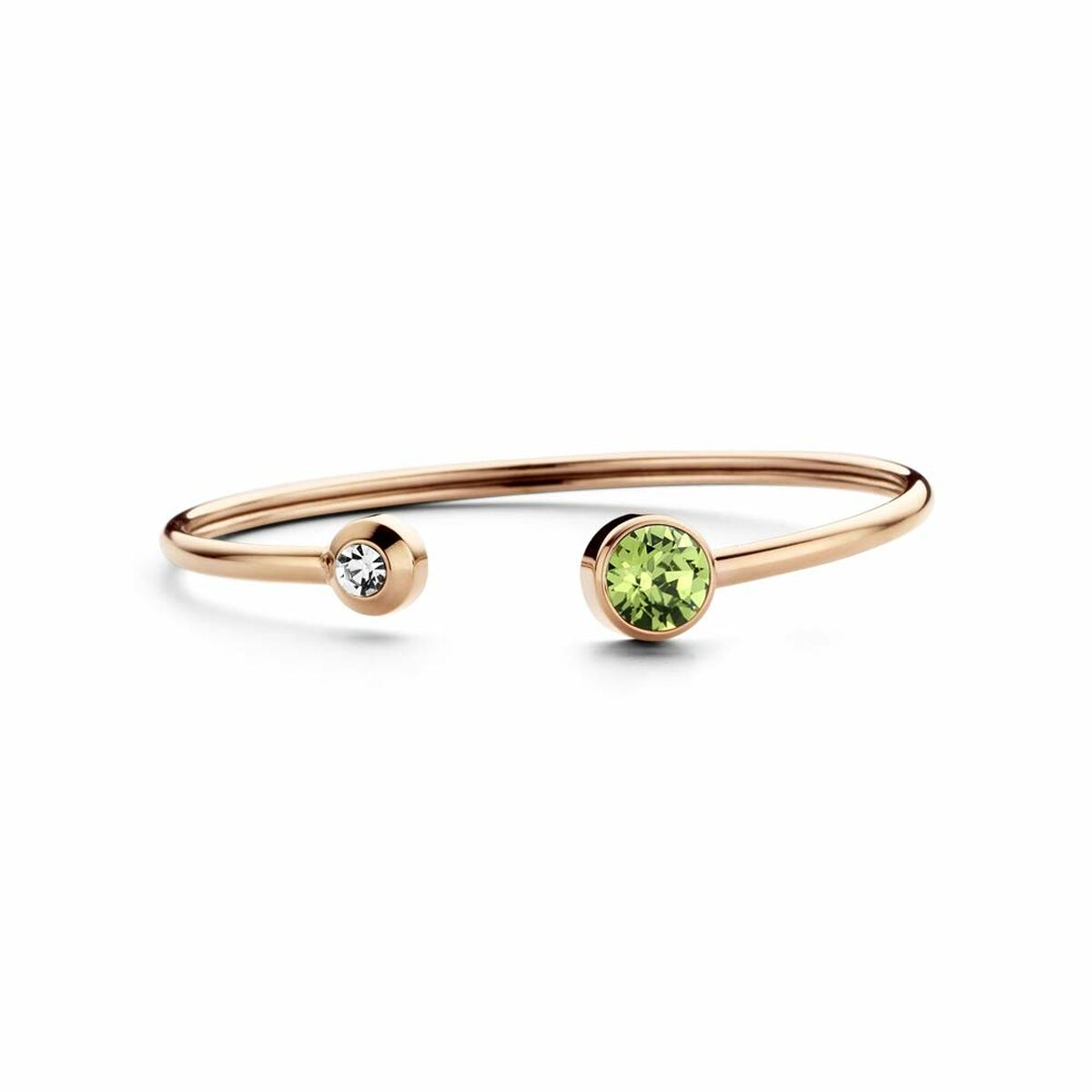 Detail van de CO88 Collection armband in roze goud met groene en heldere stenen.