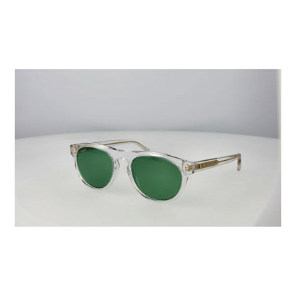 Detail van de Web Eyewear zonnebril met groene glazen en een transparant montuur.