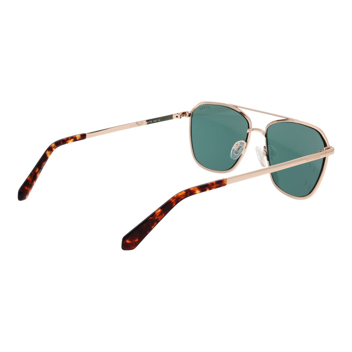 Zijaanzicht van de Guess zonnebril met goudkleurig frame en grijze lenzen.
