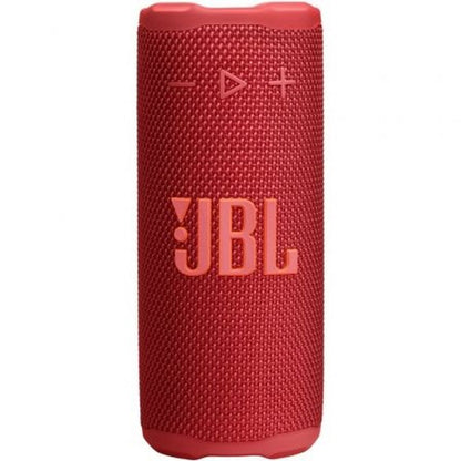 Draagbare rode JBL Bluetooth-luidspreker met robuuste textuur en bedieningselementen aan de voorkant.