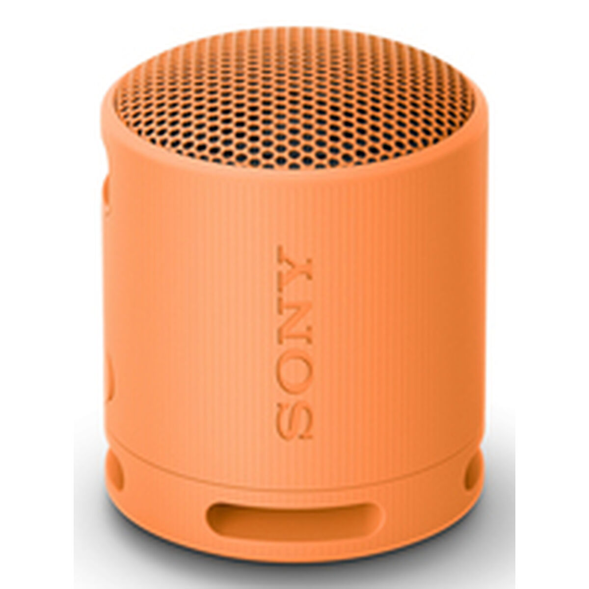 Close-up van de oranje Sony SRSXB100D luidspreker met geperforeerde bovenkant.