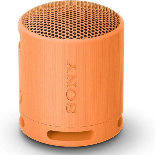 Sony SRSXB100D draagbare Bluetooth luidspreker in oranje, compact en stijlvol ontwerp.