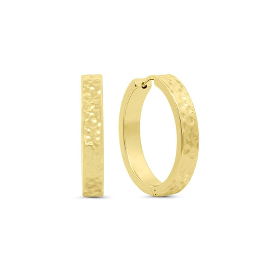 Gouden CO88 Collection oorbellen met een elegante, gestructureerde afwerking in zijaanzicht.