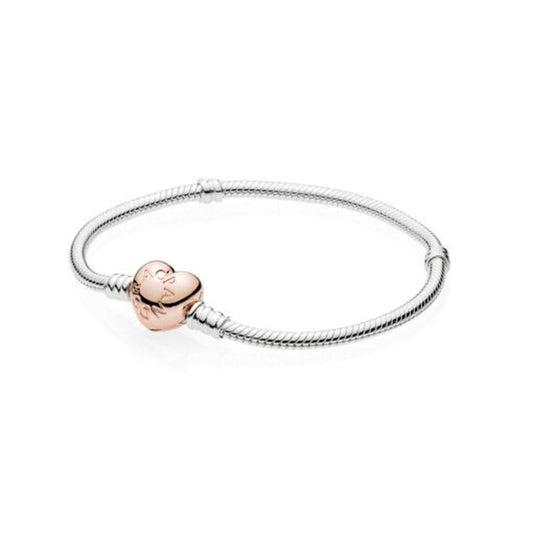 Zilverkleurige Pandora armband voor dames van 16 cm met een hartvormige sluiting.