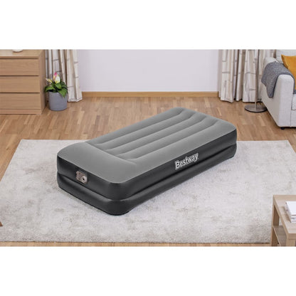 Zijaanzicht van het Bestway luchtbed met geïntegreerde pomp, grijs en comfortabel.
