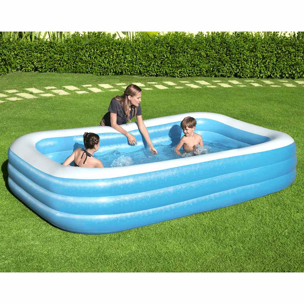 Kinderen spelen in het Bestway opblaasbare zwembad van vidaXL, met blauwe wanden en helder water.