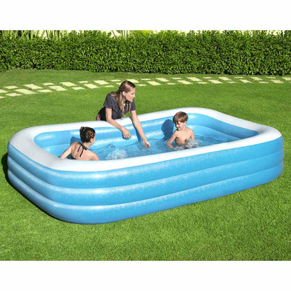 Kinderen spelen in het Bestway opblaasbare zwembad van vidaXL, met blauwe wanden en helder water.