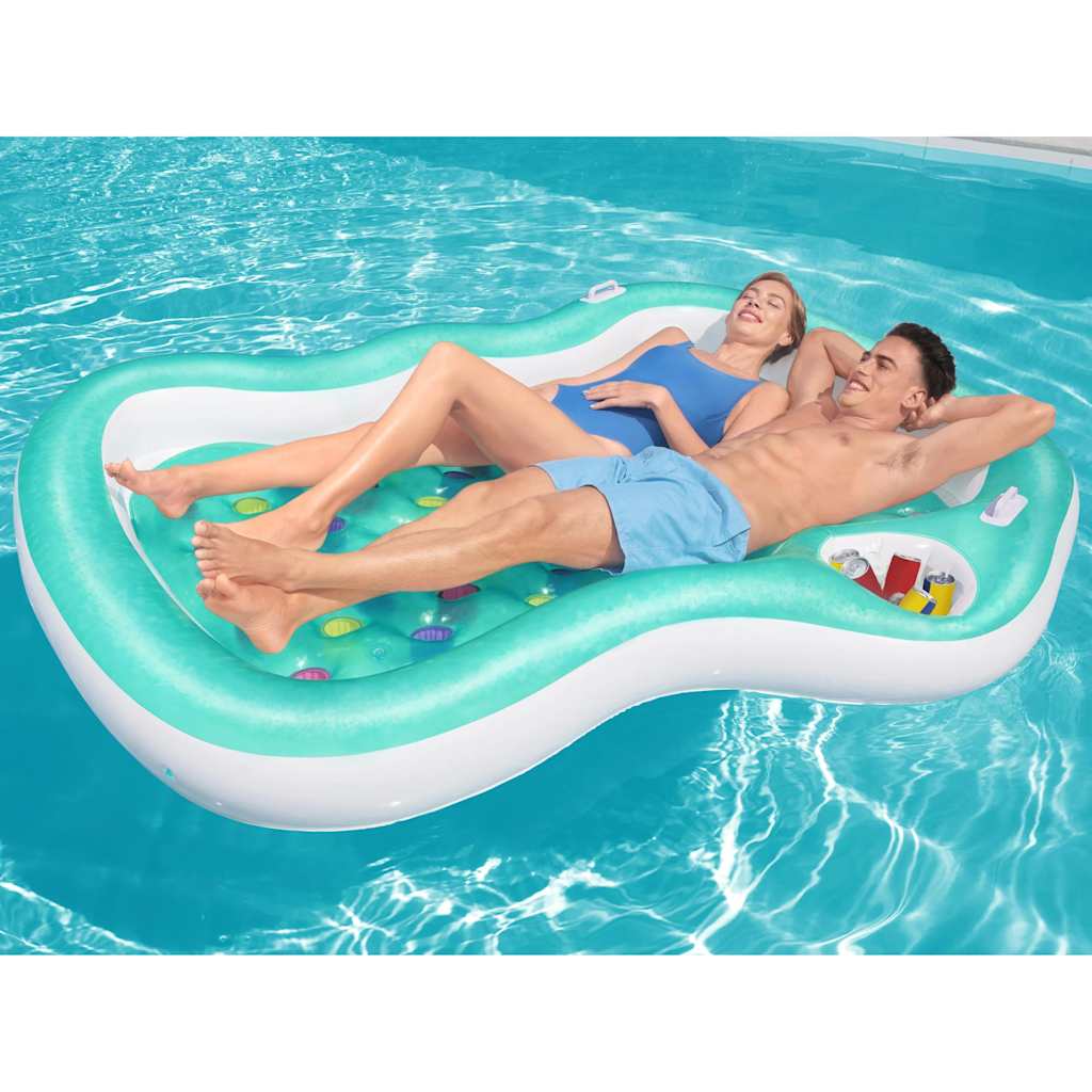 Opblaasbare lounge Bestway Double Designer in het water met twee ontspannen personen.