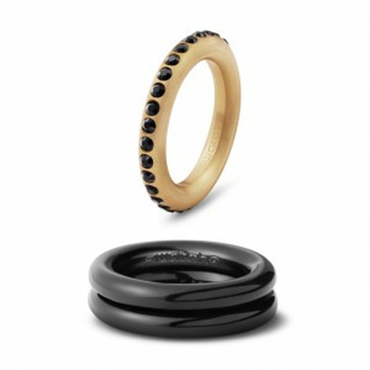 Detail van de Swatch Ring Dames met zwarte stenen en een glanzende zwarte variant.