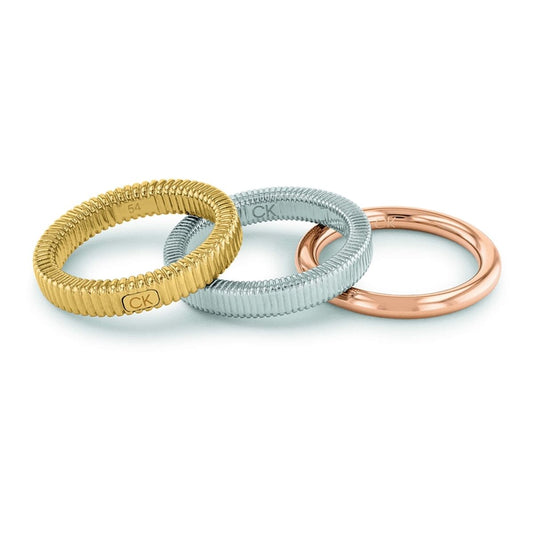 Drie Calvin Klein ringen in roestvrij staal, goud, zilver en roségoud, met een tijdloos ontwerp.