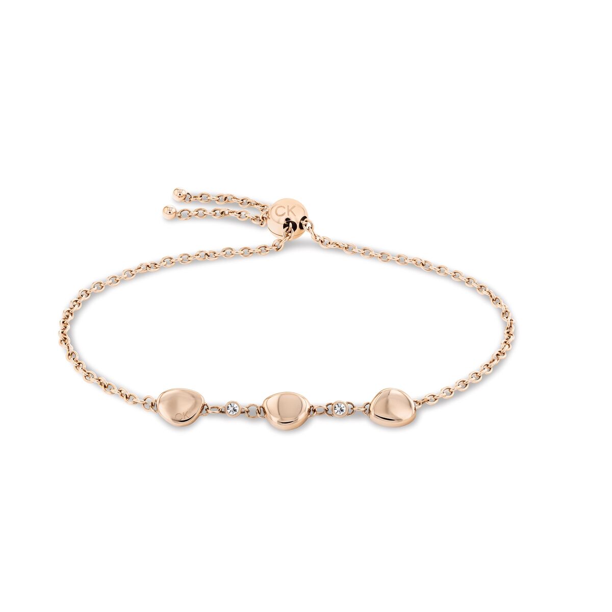 Calvin Klein damesarmband in roségoud met drie hartvormige elementen en strass.