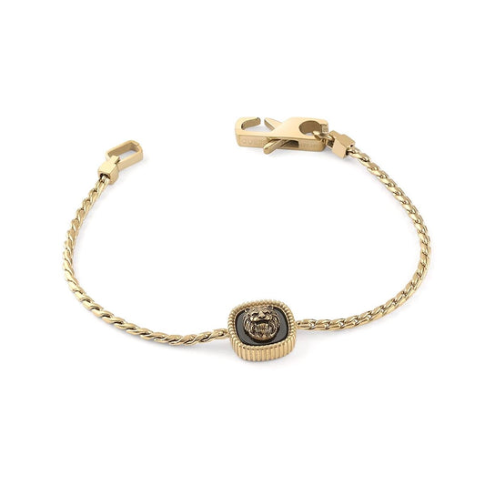 Stijlvolle Guess armband in goud en zilver met een elegant design en logo.