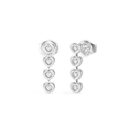 Zilverkleurige Guess oorbellen met een elegant hartontwerp en glinsterende details.