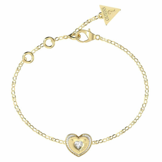 Gouden Guess armband voor dames met hartvormige hanger en sprankelende details.