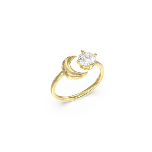Gouden Guess ring met elegante maan- en sterdetails en een stralende steen.