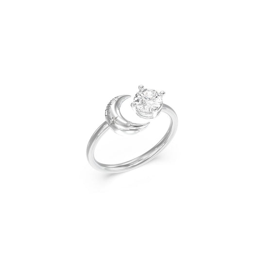 Zilverkleurige Guess ring met een elegante maan- en sterontwerp en een sprankelende steen.