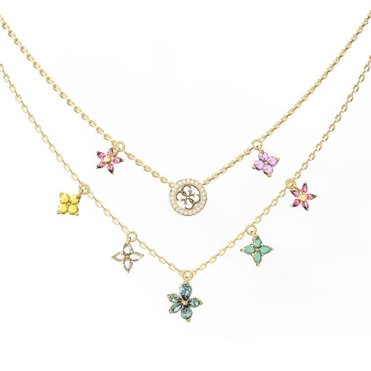 Gouden Guess ketting met kleurrijke bloemen en een elegante schijf.