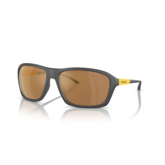 Zwarte Arnette NITEWISH zonnebril met bruine glazen en gele details, vooraanzicht.