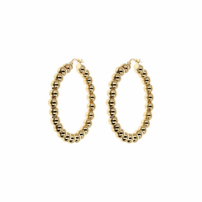 Gouden Etrusca oorbellen met een elegant, bolletjes ontwerp en een verfijnde afwerking.