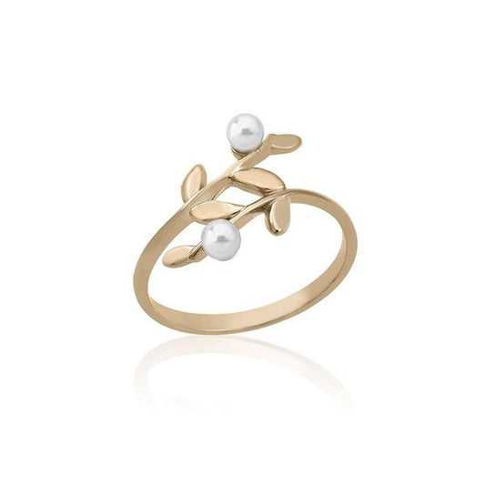 Gouden Majorica ring met elegante takvorm en pareldetails.