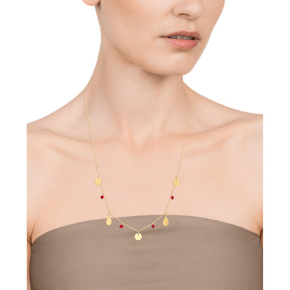 Detail van de Viceroy damesketting met gouden schakels en rode accents, gedragen door een model.