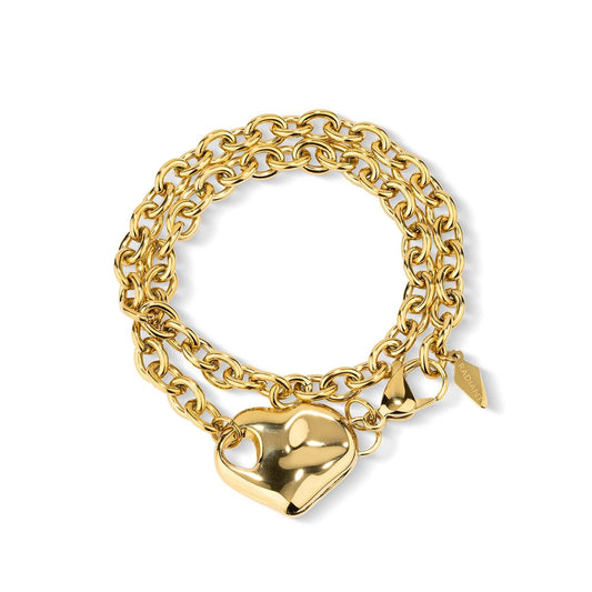 Gouden Radiant armband met elegant design en hartvormige sluiting.