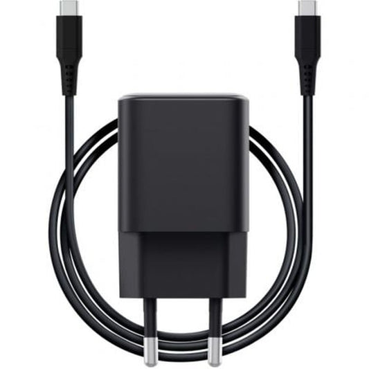 Compacte zwarte Trust oplader met USB-C kabel, ideale snelle oplaadoplossing.