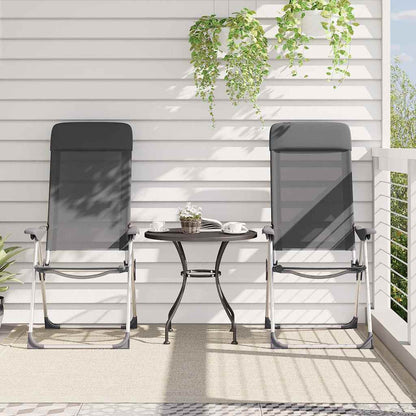 Detail van twee grijze vidaXL campingstoelen met een klein tafeltje op een balkon.