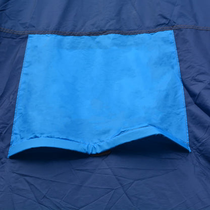 Detail van de donkerblauwe tent met een lichtblauwe flap van vidaXL.