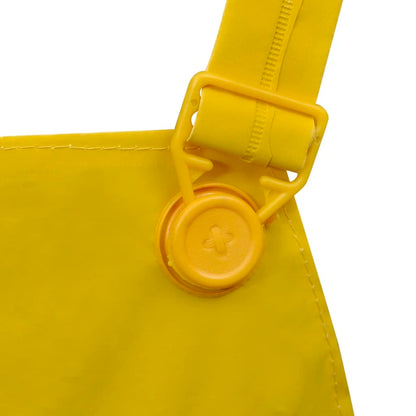 Detail van de gele vidaXL regenbroek met verstelbare schouderband en sluiting.