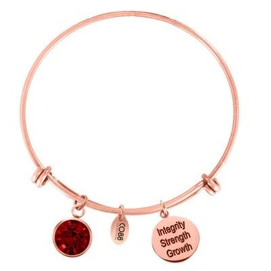 Roségouden CO88 Collection armband met rode steen en bedels, elegante stijl.