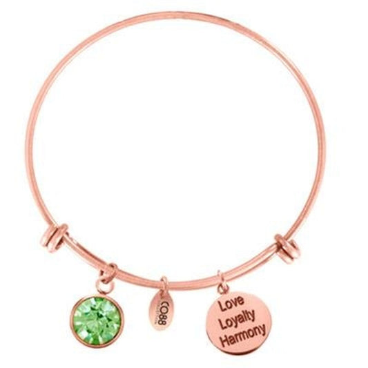 Elegante CO88 Collection armband in roségoud met groene steen en bedels met teksten.