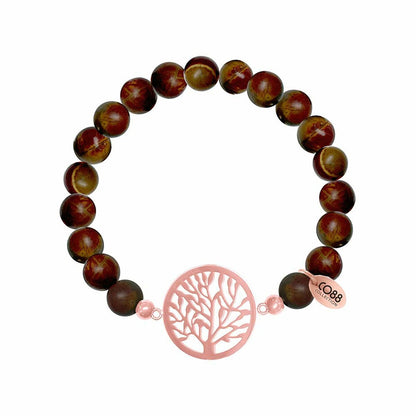 Detail van de elegante bruine CO88 Collection armband met een boomdesign.