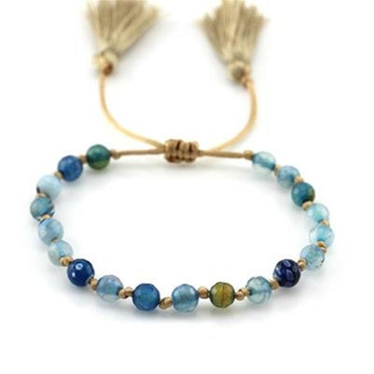 Elegante blauwe CO88 Collection armband met kralen en franjes, perfect voor elke gelegenheid.