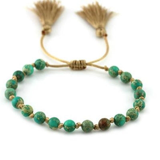Groene CO88 Collection armband met elegante kralen en franjes, stijlvolle uitstraling.