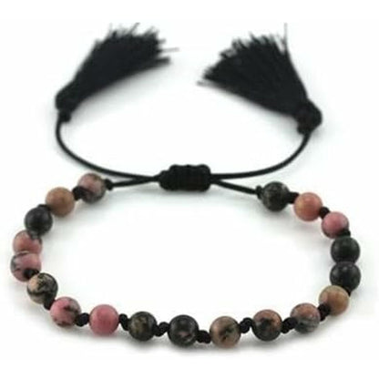 Detail van de CO88 Collection armband met multicolour kralen en zwarte franjes.