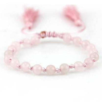 Roze CO88 Collection armband met elegante kralen en franjes.