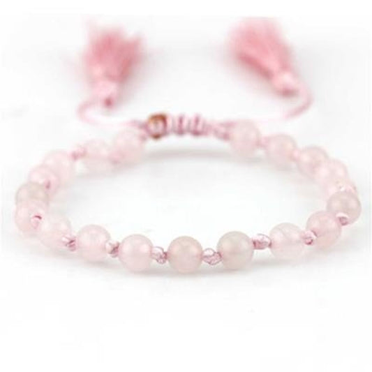 Roze CO88 Collection armband met elegante kralen en franjes.