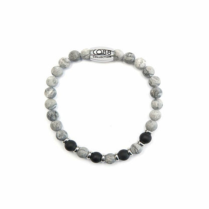Detail van de CO88 Collection armband met grijze en zwarte kralen in stijlvol ontwerp.