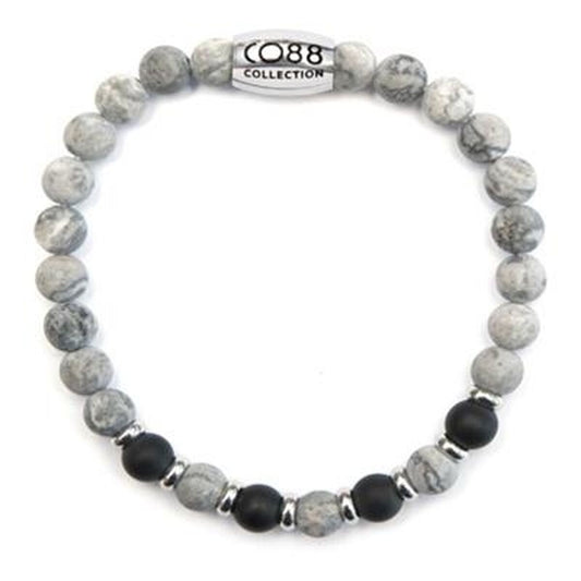 Elegante zilverkleurige armband van CO88 Collection met grijze en zwarte kralen.