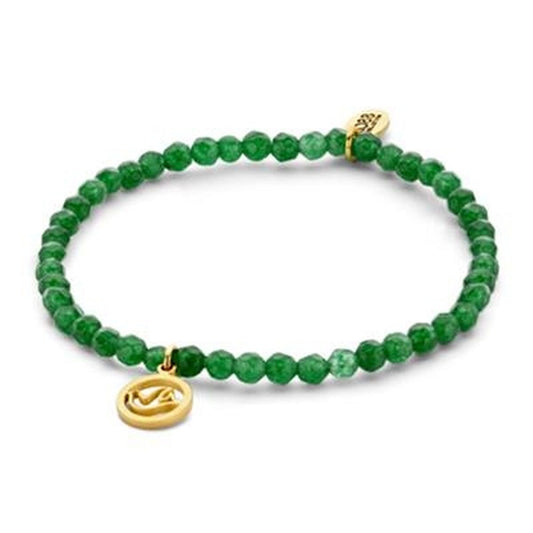 Groene CO88 Collection armband met stijlvolle gouden charm, elegant ontwerp.