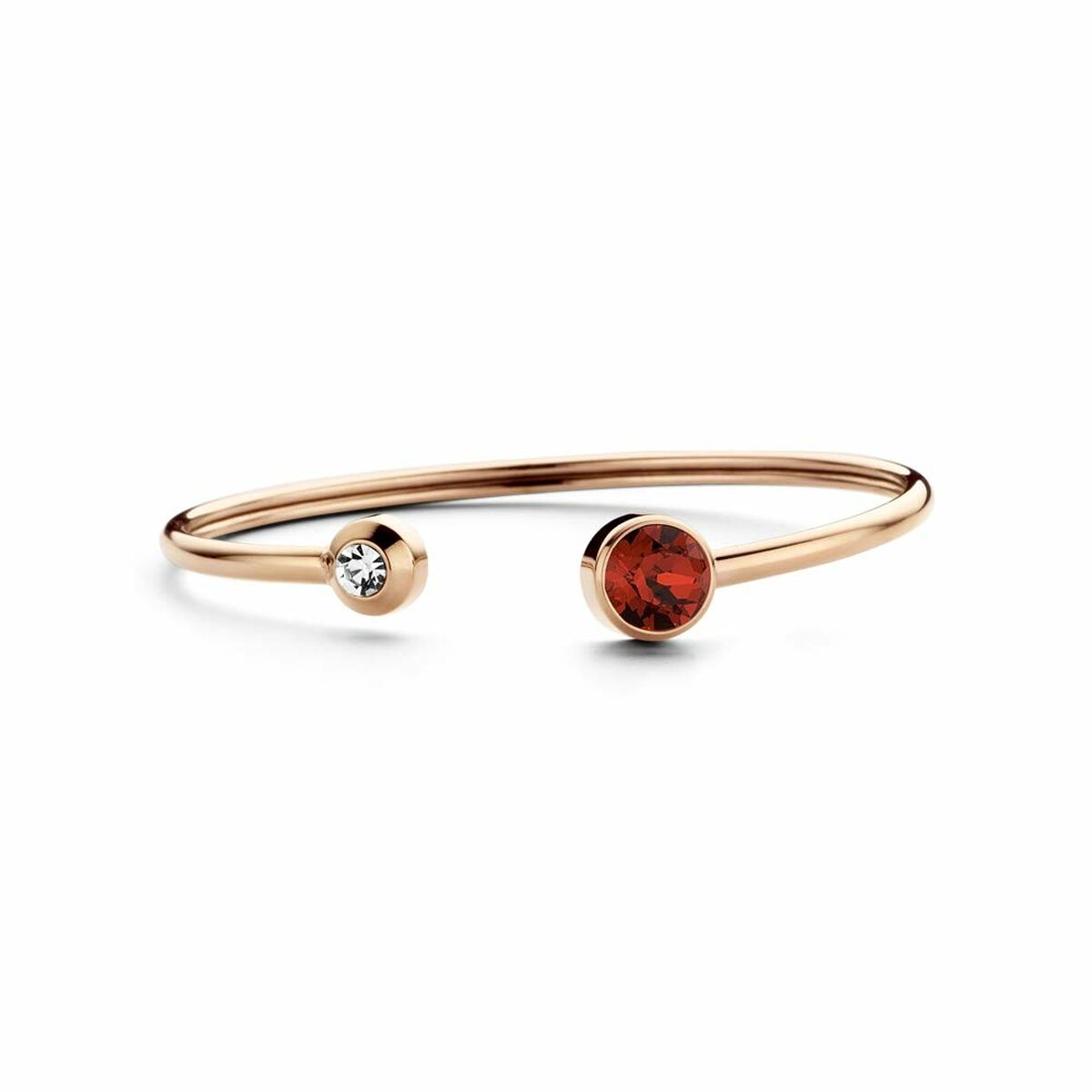 Detail van de CO88 Collection gouden armband met twee kleurrijke stenen aan de uiteinden.