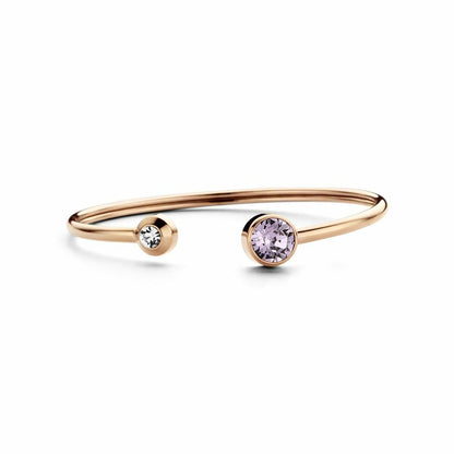 Detail van de CO88 Collection armband in roze goud met twee elegante stenen.