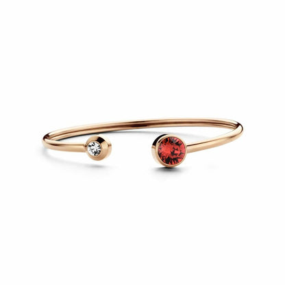 Detail van de CO88 Collection armband in roze goud met twee kleurrijke stenen.
