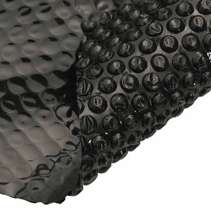 Detail van de zwarte vidaXL zwembadhoes met bubbels voor optimale warmte-isolatie.