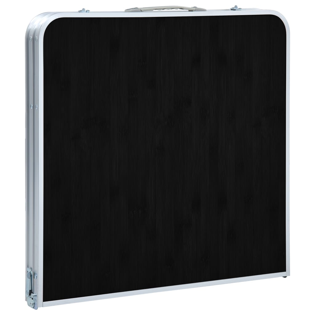 Zijaanzicht van de vidaXL inklapbare campingtafel in gesloten positie, met zwarte bovenkant en aluminium rand.
