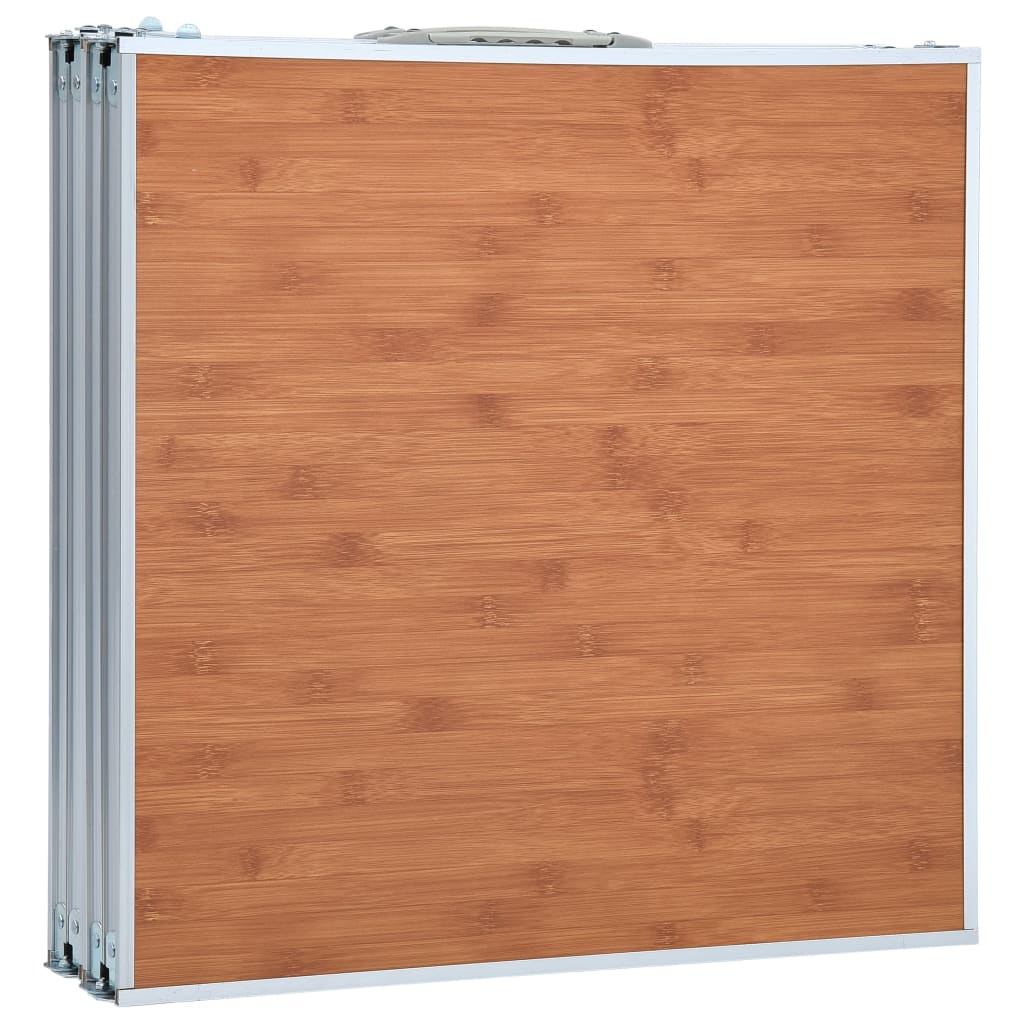 Detail van de inklapbare vidaXL campingtafel met een houten uitstraling en aluminium frame.