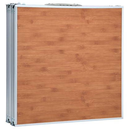 Detail van de inklapbare vidaXL campingtafel met een houten uitstraling en aluminium frame.